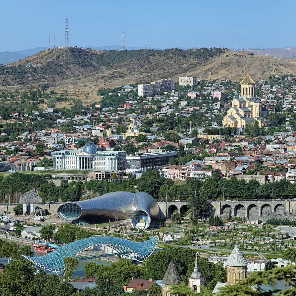 View of the Holy Trinity Cathedral, Building of Presidential Administration, Concert hall and pedestrian Bridge of Peace