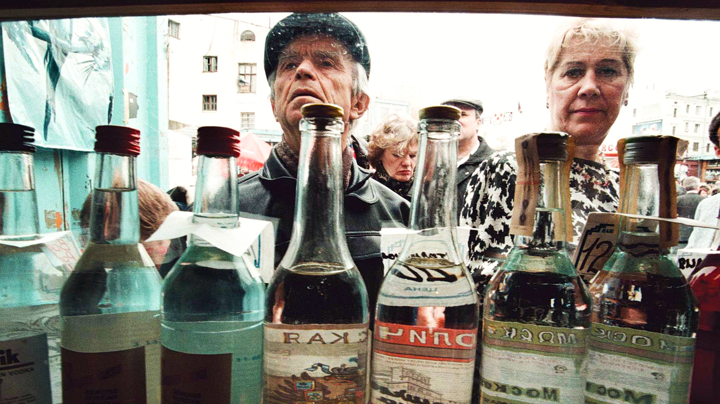 Shoppers check out vodka in a street kiosk in Moscow in 2008.