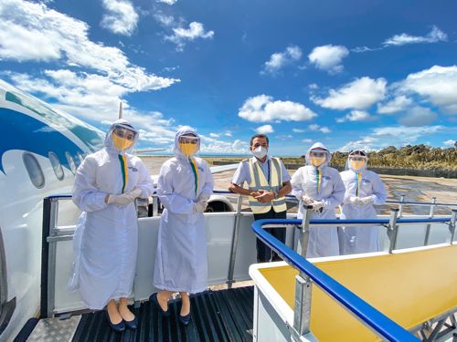 Cebu Pacific crew in full PPE