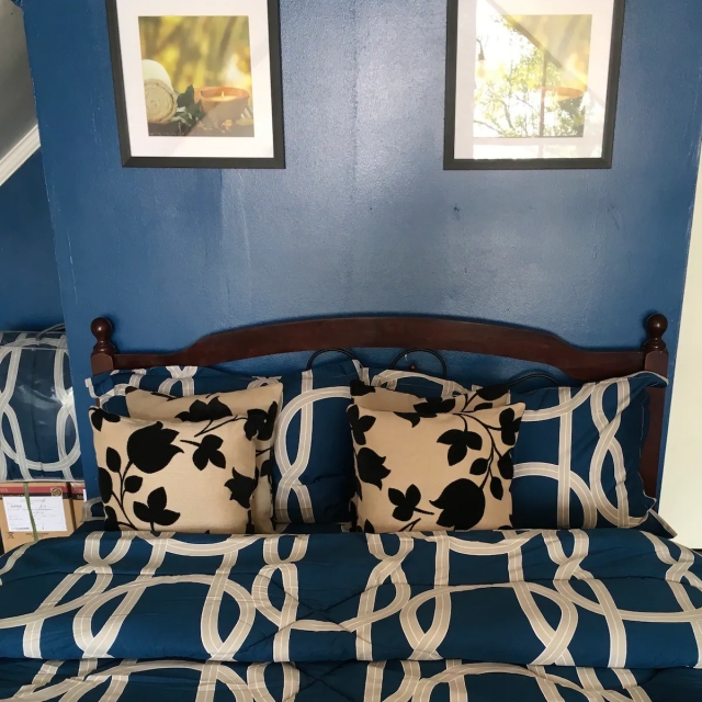 Nova Scotia Beach Resort bed with comforter and linen